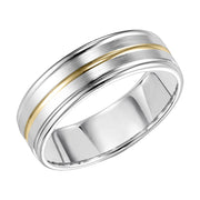 Sleek lines inspired the design of this two-tone gold, Comfort Fit wedding band enhanced with a brushed finish and round edges to complete the look
