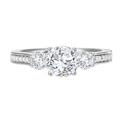 This impressive 3-stone diamond engagement ring dazzles brilliantly with its diamond accented band