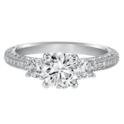 This eye-catching 3-stone engagement sparkles with its diamond prong set band with engraving and milgrain details