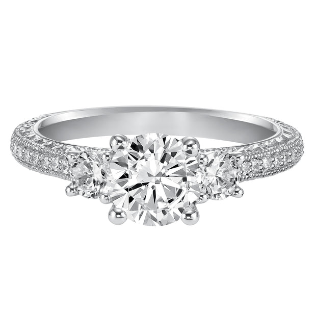 This eye-catching 3-stone engagement sparkles with its diamond prong set band with engraving and milgrain details