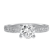Milgrain detailing accents the diamond prong set band of this magnificent engagement ring