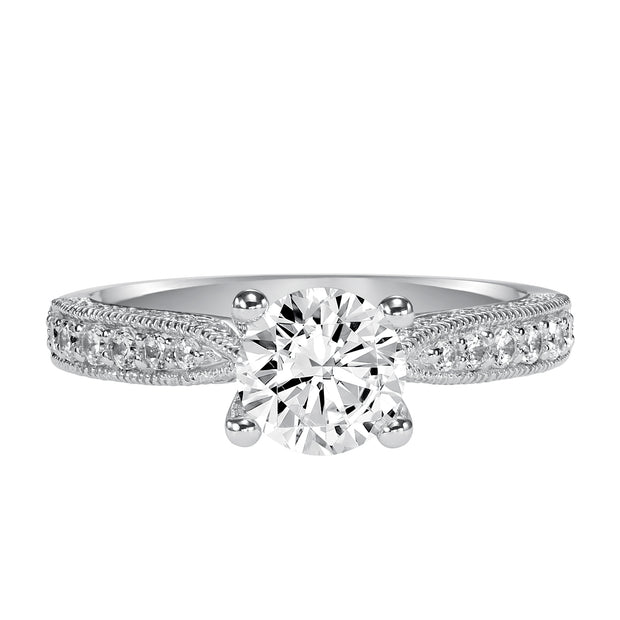 Milgrain detailing accents the diamond prong set band of this magnificent engagement ring