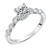 Dazzling with its intricately designed diamond band, this engagement ring is distinct yet enchanting