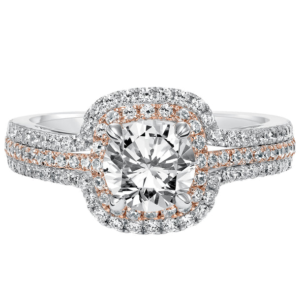 This engagement ring is truly breathtaking featuring both rose and white gold in its prong set diamond double halo and three row band design