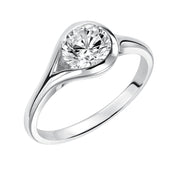Chic and modern, this engagement ring is set beautifully in a high polished bezel set and bypass designed band