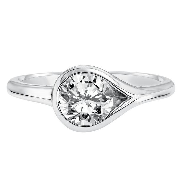 Chic and modern, this engagement ring is set beautifully in a high polished bezel set and bypass designed band
