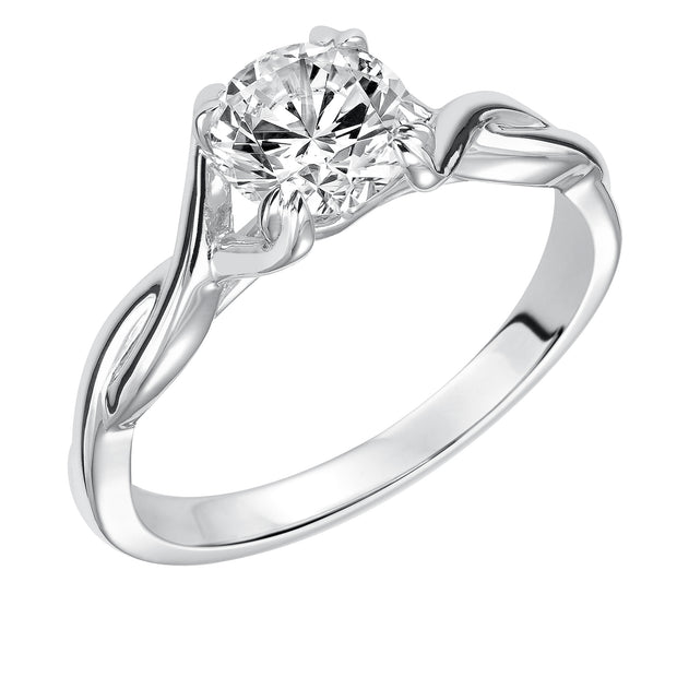 This ribbon-twist inspired high polished band gracefully accentuates the center diamond