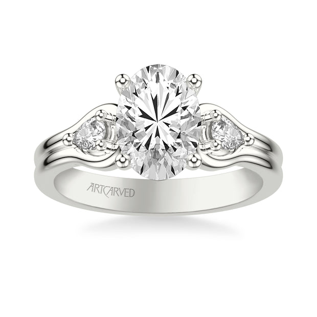 Classic Three-Stone Engagement Ring with Pear Side Stones and Double Row Polished Shank
