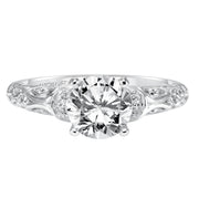 Diamond engagement ring with round center stone and carved diamond enhanced band