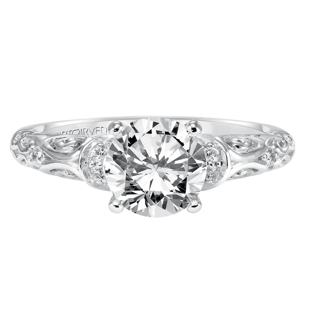 Diamond engagement ring with round center stone and carved diamond enhanced band